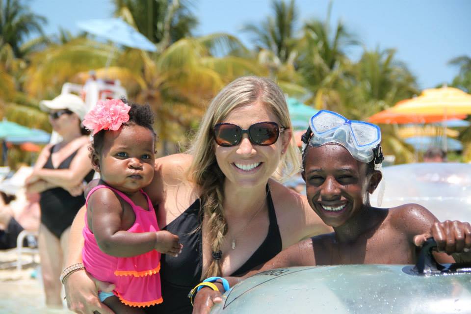 Mom with adopted son and daughter in water at Castaway Cay Disney Cruise Line's Private Island | Global Munchkins