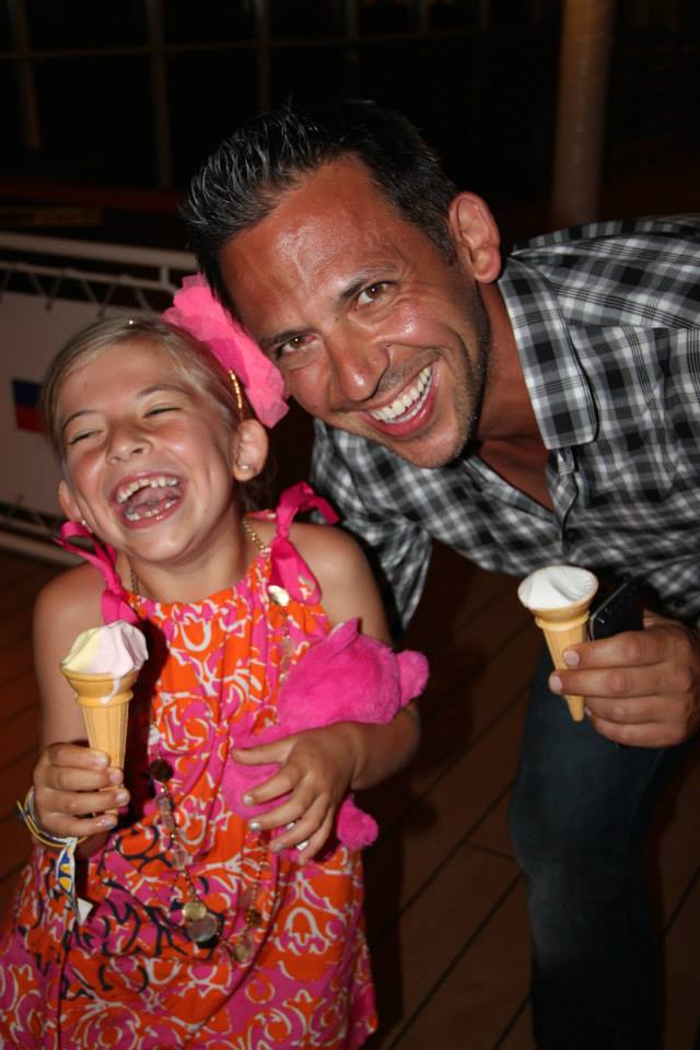 Father and Daughter laughing and eating ice cream on Disney Cruise Line- Global Munchkins