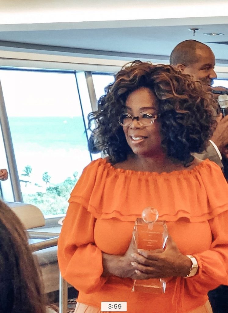 Oprah with Award